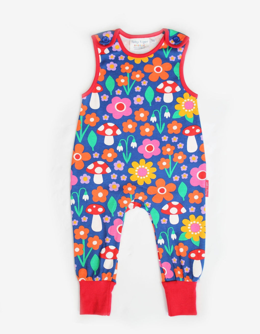 Organic cotton romper with flower and mushroom pattern
